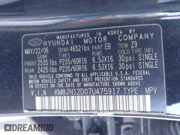 2007 Hyundai Tucson SE with VIN KM8JN12D07U475917, listed as a IAAI auction lot 41872876 with 172,006 mi miles. Bid and sale history available at carsss.com. Image 9.