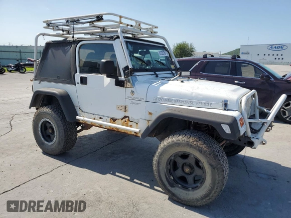 1999 Jeep Wrangler Sport with VIN 1J4FY19SXXP464096, listed as a Copart auction lot 61233105 with 167,350 mi miles and Clean title. Bid and sale history available at DreamBid. Image 4.