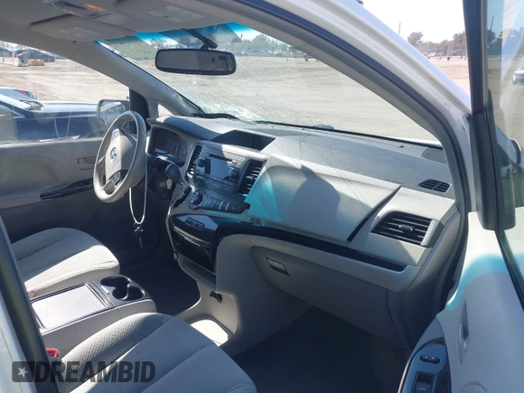2014 Toyota Sienna LE AAS with VIN 5TDKK3DC4ES515791, listed as a IAAI auction lot 42304201 with 113,139 mi miles and . Bid and sale history available at DreamBid. Image 5.