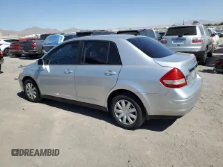 2011 Nissan Versa S with VIN 3N1BC1AP0BL410081, listed as a Copart auction lot 73737064 with 201,142 mi miles and Salvage title. Bid and sale history available at DreamBid. Image 2.