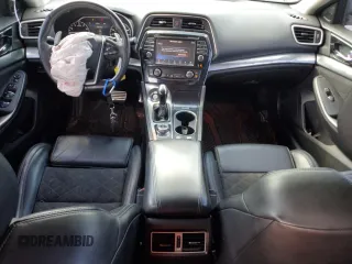 2016 Nissan Maxima SR z VIN 1N4AA6APXGC439401, wystawiony jako Copart lot #52011535 z przebiegiem 132 267 mil mil oraz Szkoda całkowita • Salvage title. Historia ofert i sprzedaży dostępna na DreamBid. Obrazek 8.