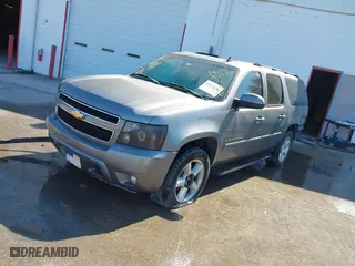 2007 Chevrolet Suburban LTZ with VIN 3GNFC16087G242868, listed as a IAAI auction lot 41872386 with 203,525 mi miles. Bid and sale history available at carsss.com. Image 2.