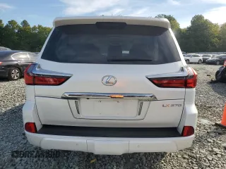 2019 Lexus LX with VIN JTJHY7AX4K4294785, listed as a Copart auction lot 70458704 with 45,477 mi miles and Salvage Title. Bid and sale history available at carsss.com. Image 6.