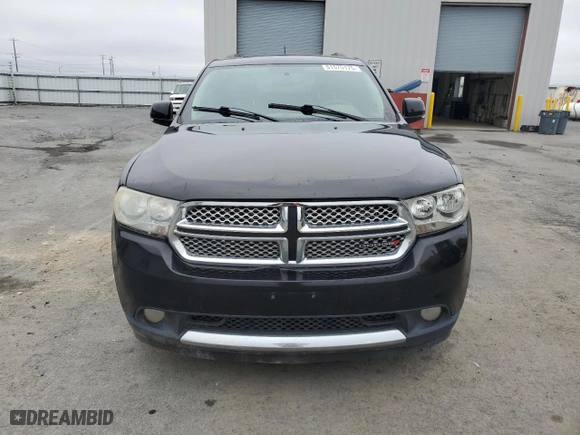 2013 Dodge Durango Crew with VIN 1C4SDJDTXDC565576, listed as a Copart auction lot 51575175 with 184,302 mi miles and Clean Title. Bid and sale history available at carsss.com. Image 5.