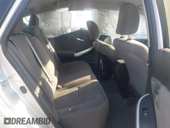 2015 Toyota Prius Four z VIN JTDKN3DU9F1888663, wystawiony jako IAAI lot #42150877 z przebiegiem 138 414 mil mil oraz . Historia ofert i sprzedaży dostępna na DreamBid. Obrazek 8.