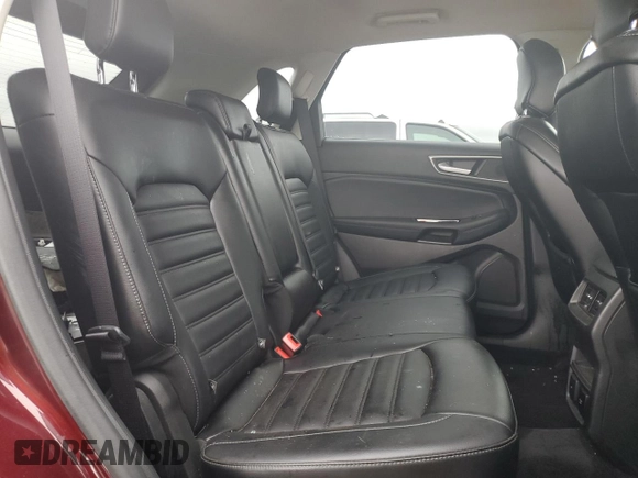 2019 Ford Edge SEL with VIN 2FMPK4J92KBB34891, listed as a Copart auction lot 60050945 with 104,942 mi miles and Salvage title. Bid and sale history available at DreamBid. Image 11.