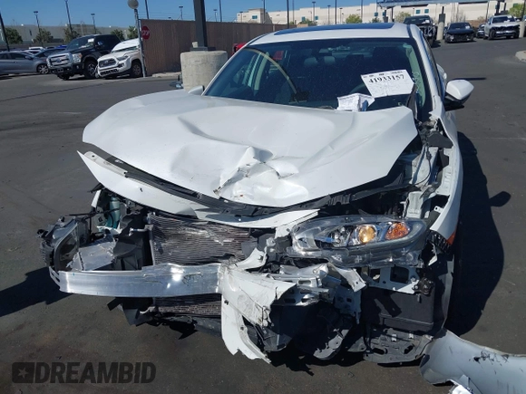 2018 Honda Civic EX with VIN 2HGFC2F71JH502564, listed as a IAAI auction lot 41933157 with 56,696 mi miles and . Bid and sale history available at DreamBid. Image 6.