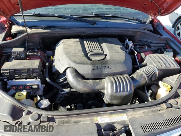2011 Jeep Grand Cherokee Overland with VIN 1J4RS6GG7BC665979, listed as a Copart auction lot 83394214 with 216,988 mi miles and Salvage Title. Bid and sale history available at DreamBid. Image 12.