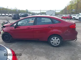 2013 Ford Fiesta SE z VIN 3FADP4BJ1DM192788, wystawiony jako IAAI lot #42018716 z przebiegiem 148 212 mil mil oraz . Historia ofert i sprzedaży dostępna na DreamBid. Obrazek 14.