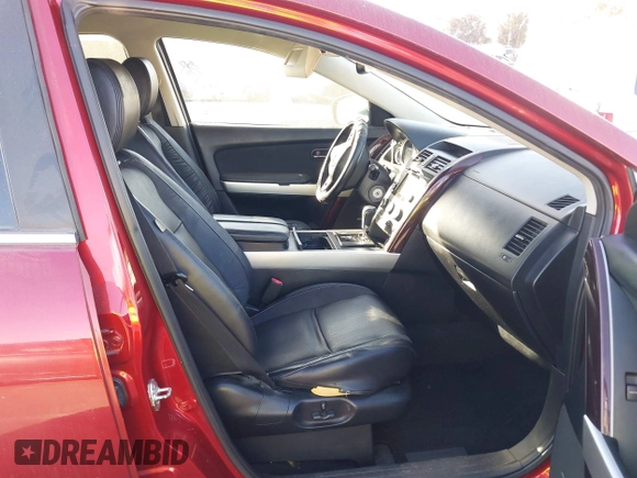 2014 Mazda CX-9 Grand Touring with VIN JM3TB3DV6E0435389, listed as a IAAI auction lot 41406200 with 181,598 mi miles and . Bid and sale history available at DreamBid. Image 5.