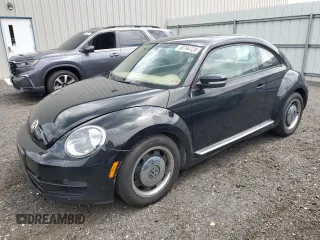 2013 Volkswagen Beetle 2.5L with VIN 3VWHP7AT3DM634936, listed as a Copart auction lot 58794135 with 76,290 mi miles and Clean title. Bid and sale history available at DreamBid. Image 1.