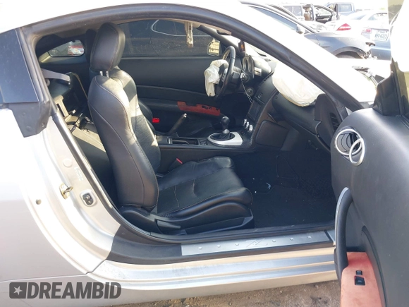2006 Nissan 350Z Grand Touring with VIN JN1AZ34D56M308634, listed as a IAAI auction lot 41879959 with 148,660 mi miles. Bid and sale history available at carsss.com. Image 5.