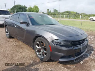 2015 Dodge Charger SXT with VIN 2C3CDXHG7FH886502, listed as a IAAI auction lot 42072027 with 105,034 mi miles and . Bid and sale history available at DreamBid. Image 1.
