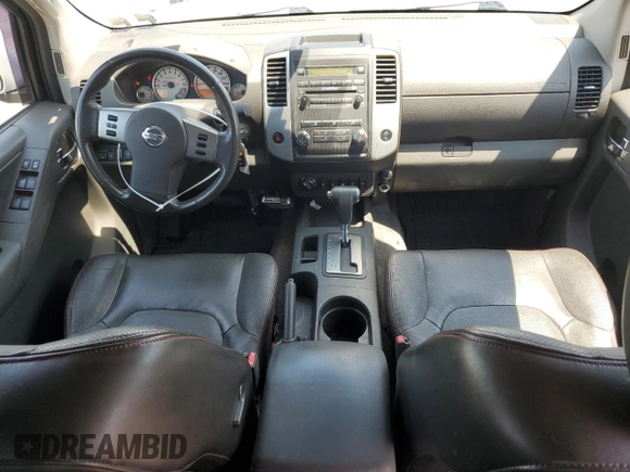 2010 Nissan Frontier Pro-4X with VIN 1N6AD0EV5AC435641, listed as a Copart auction lot 63388025 with 84,349 mi miles and Salvage title. Bid and sale history available at DreamBid. Image 8.