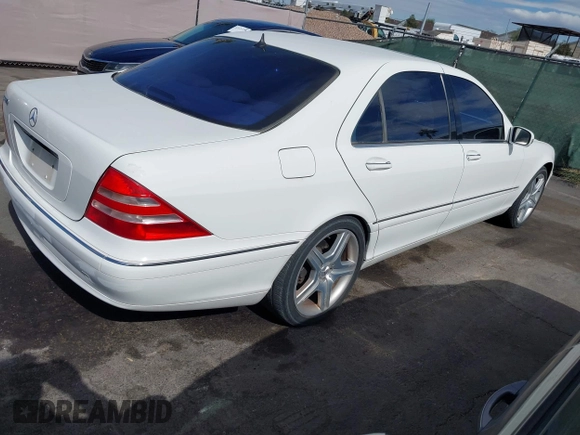 2002 Mercedes-Benz S 5.0L with VIN WDBNG75J92A261294, listed as a IAAI auction lot 42141509 with 116,532 mi miles. Bid and sale history available at carsss.com. Image 4.