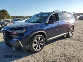 2023 Honda Pilot Touring with VIN 5FNYG2H73PB007631, listed as a Copart auction lot 82382153 with 6,050 mi miles. Bid and sale history available at carsss.com. Image 1.