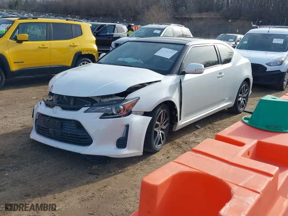 2016 Scion tC with VIN JTKJF5C73GJ014254, listed as a IAAI auction lot 41751320 with 104,247 mi miles. Bid and sale history available at carsss.com. Image 17.