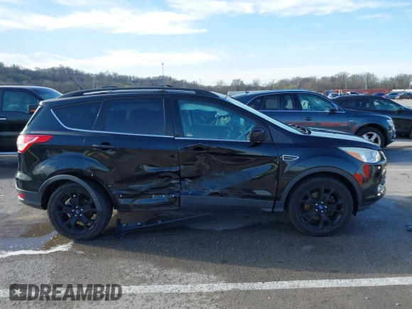 2013 Ford Escape SE with VIN 1FMCU9GX9DUB92246, listed as a IAAI auction lot 41808372 with 73,472 mi miles. Bid and sale history available at carsss.com. Image 13.