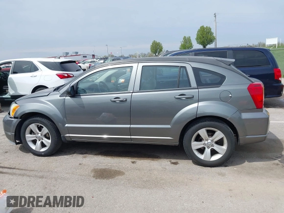 2012 Dodge Caliber SXT with VIN 1C3CDWDA6CD506019, listed as a IAAI auction lot 41999560 with 146,446 mi miles and . Bid and sale history available at DreamBid. Image 15.