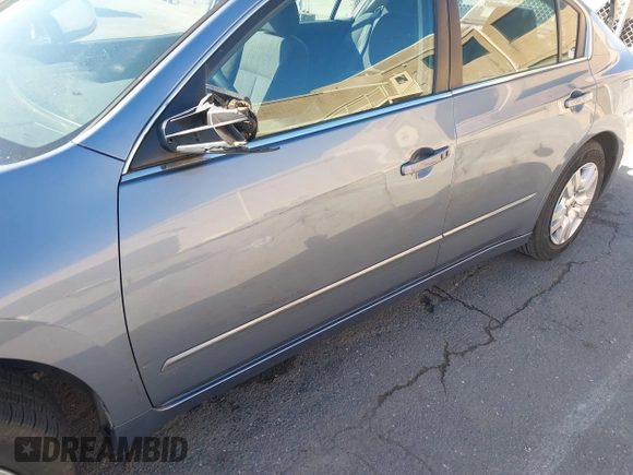 2011 Nissan Altima S with VIN 1N4AL2AP6BC174018, listed as a IAAI auction lot 41324079 with 77,021 mi miles and . Bid and sale history available at DreamBid. Image 6.
