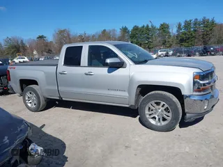 2018 Chevrolet Silverado 1500 LT with VIN 1GCVKREH4JZ323242, listed as a IAAI auction lot 41971945 with 63,915 mi miles and . Bid and sale history available at DreamBid. Image 13.