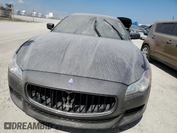 2016 Maserati Quattroporte S Q4 z VIN ZAM56RRA2G1188539, wystawiony jako Copart lot #74623484 z przebiegiem Nie podano mil oraz Szkoda całkowita • Salvage title. Historia ofert i sprzedaży dostępna na DreamBid. Obrazek 5.