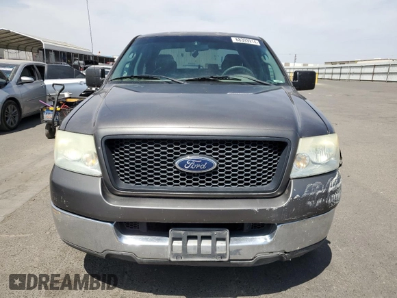 2004 Ford F-150 XLT with VIN 1FTRW12W74KC26169, listed as a Copart auction lot 68393914 with 118,059 mi miles and Salvage Title. Bid and sale history available at DreamBid. Image 5.