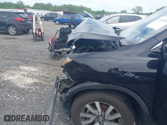 2021 Honda Pilot EX-L with VIN 5FNYF6H53MB097089, listed as a IAAI auction lot 42309359 with 58,371 mi miles and . Bid and sale history available at DreamBid. Image 6.