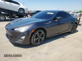 2013 Scion FR-S z VIN JF1ZNAA16D2725463, wystawiony jako Copart lot #51678805 z przebiegiem 102 305 mil mil oraz Czysty tytuł • Clean title. Historia ofert i sprzedaży dostępna na DreamBid. Obrazek 1.