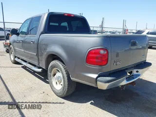 2003 Ford F-150 XLT with VIN 1FTRW07L63KA65904, listed as a IAAI auction lot 41983556 with 166,086 mi miles. Bid and sale history available at carsss.com. Image 3.