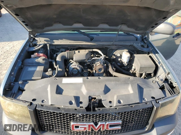 2009 GMC Sierra 1500 Work Truck z VIN 1GTEC19X89Z269438, wystawiony jako Copart lot #73713864 z przebiegiem 210 879 mil mil oraz Szkoda całkowita • Salvage title. Historia ofert i sprzedaży dostępna na DreamBid. Obrazek 13.