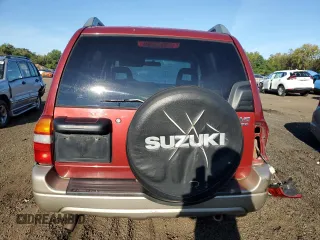2002 Suzuki Grand Vitara JLX z VIN JS3TD62VX24151115, wystawiony jako Copart lot #71155924 z przebiegiem 264 639 mil mil oraz Szkoda całkowita • Salvage title. Historia ofert i sprzedaży dostępna na DreamBid. Obrazek 6.