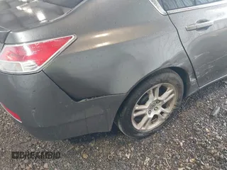 2010 Acura TL Technology z VIN 19UUA8F53AA010857, wystawiony jako IAAI lot #42242723 z przebiegiem 232 866 mil mil oraz . Historia ofert i sprzedaży dostępna na DreamBid. Obrazek 6.