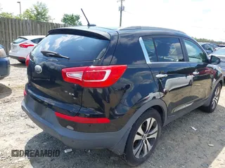 2013 Kia Sportage EX with VIN KNDPCCA21D7457355, listed as a IAAI auction lot 42694813 with 155,879 mi miles and . Bid and sale history available at DreamBid. Image 4.