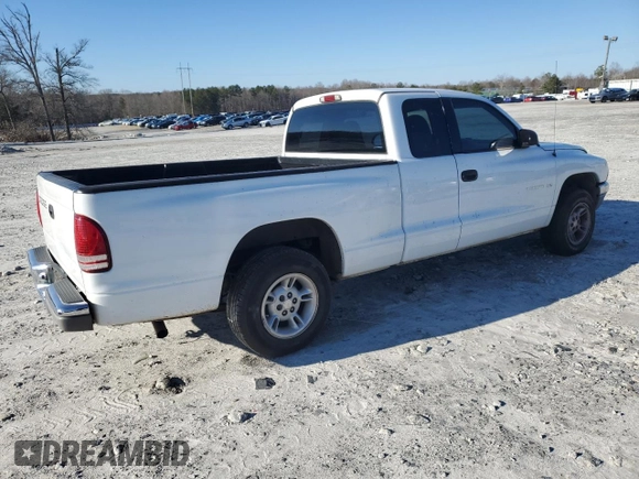 1999 Dodge Dakota SLT z VIN 1B7GL22X9XS188317, wystawiony jako Copart lot #47997795 z przebiegiem 125 090 mil mil oraz Szkoda całkowita • Salvage title. Historia ofert i sprzedaży dostępna na DreamBid. Obrazek 3.