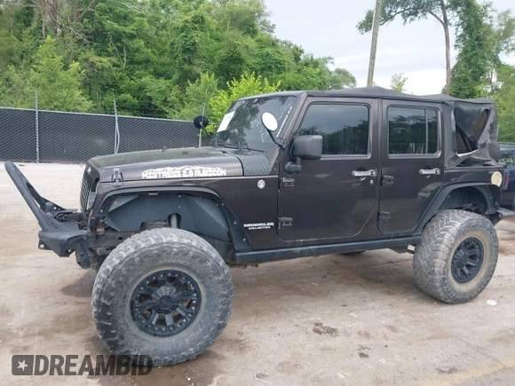 2013 Jeep Wrangler Unlimited Rubicon with VIN 1C4BJWFG5DL652050, listed as a IAAI auction lot 42451954 with 107,110 mi miles and . Bid and sale history available at DreamBid. Image 14.
