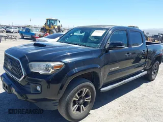 2018 Toyota Tacoma SR5 with VIN 3TMBZ5DN1JM014540, listed as a IAAI auction lot 42505324 with 112,990 mi miles and . Bid and sale history available at DreamBid. Image 17.