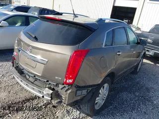 2014 Cadillac SRX Luxury Collection with VIN 3GYFNBE35ES658546, listed as a IAAI auction lot 41690861 with 66,263 mi miles. Bid and sale history available at carsss.com. Image 4.