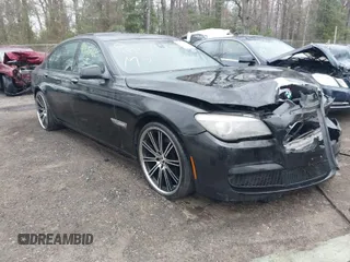 2011 BMW 7 Series 740Li with VIN WBAKB4C51BC574199, listed as a IAAI auction lot 41935661 with 149,404 mi miles. Bid and sale history available at carsss.com. Image 1.
