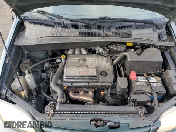 2001 Toyota Sienna LE with VIN 4T3ZF13C51U345619, listed as a Copart auction lot 71761094 with 165,000 mi miles and Salvage Title. Bid and sale history available at carsss.com. Image 12.