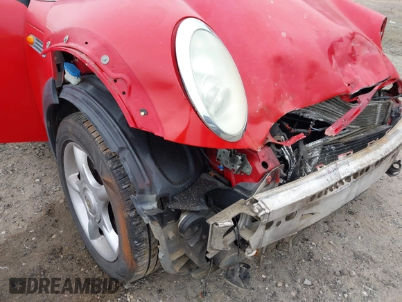 2005 MINI Hardtop with VIN WMWRC33485TJ67837, listed as a IAAI auction lot 41806208 with 140,646 mi miles and . Bid and sale history available at DreamBid. Image 13.