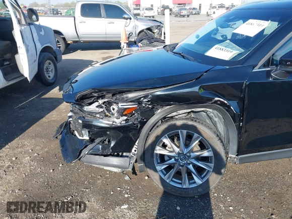2020 Mazda CX-5 Grand Touring with VIN JM3KFBDM0L0790508, listed as a IAAI auction lot 41883319 with 114,398 mi miles and . Bid and sale history available at carsss.com. Image 17.