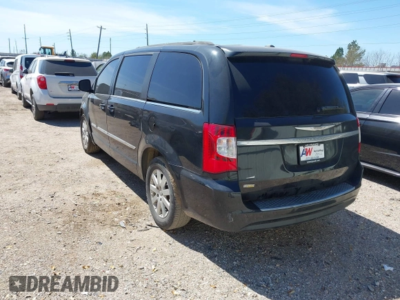2013 Chrysler Town & Country Touring with VIN 2C4RC1BGXER216837, listed as a IAAI auction lot 41813424 with 216,395 mi miles and . Bid and sale history available at DreamBid. Image 3.