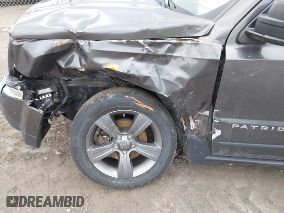2015 Jeep Patriot High Altitude with VIN 1C4NJPFA2FD297575, listed as a IAAI auction lot 41848731 with 77,149 mi miles and . Bid and sale history available at DreamBid. Image 6.