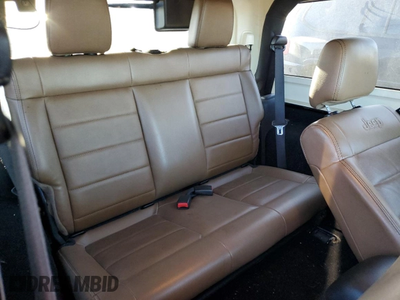 2011 Jeep Wrangler Sahara with VIN 1J4GA5D16BL567739, listed as a Copart auction lot 73542244 with 282,392 mi miles and Non Repairable. Bid and sale history available at DreamBid. Image 11.