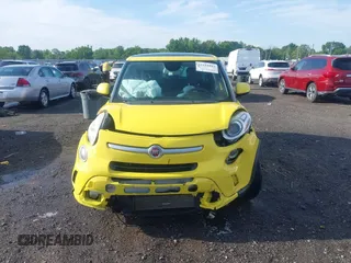 2014 FIAT 500L Trekking z VIN ZFBCFADH4EZ013485, wystawiony jako IAAI lot #42104043 z przebiegiem 157 744 mil mil oraz . Historia ofert i sprzedaży dostępna na DreamBid. Obrazek 12.