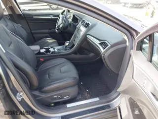 2014 Ford Fusion Energi Titanium with VIN 3FA6P0SUXER216960, listed as a IAAI auction lot 41339413 with 85,025 mi miles. Bid and sale history available at carsss.com. Image 5.