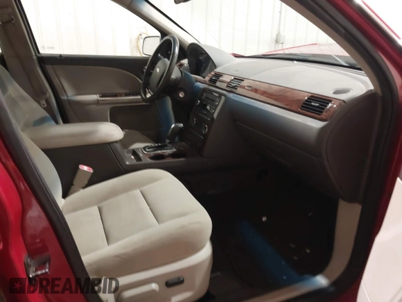 2009 Ford Taurus SEL with VIN 1FAHP24W89G123452, listed as a IAAI auction lot 41335622 with 229,182 mi miles. Bid and sale history available at carsss.com. Image 5.