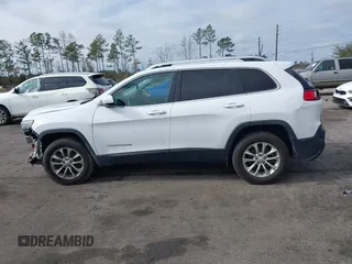 2019 Jeep Cherokee Latitude with VIN 1C4PJMCX0KD336934, listed as a IAAI auction lot 41172828 with 47,477 mi miles. Bid and sale history available at carsss.com. Image 14.