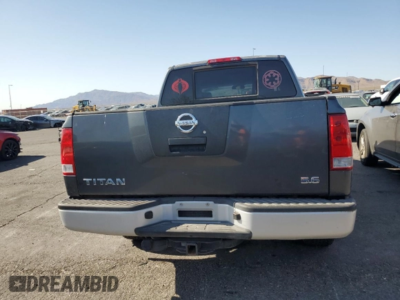 2007 Nissan Titan XE with VIN 1N6AA07A67N200469, listed as a Copart auction lot 52121955 with 176,103 mi miles and Salvage Title. Bid and sale history available at DreamBid. Image 6.